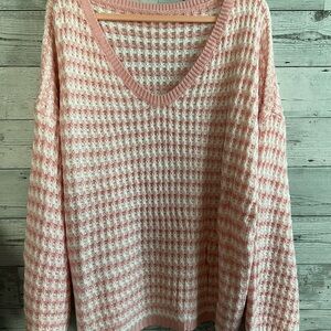 Beautiful oversized pink and white sweater!